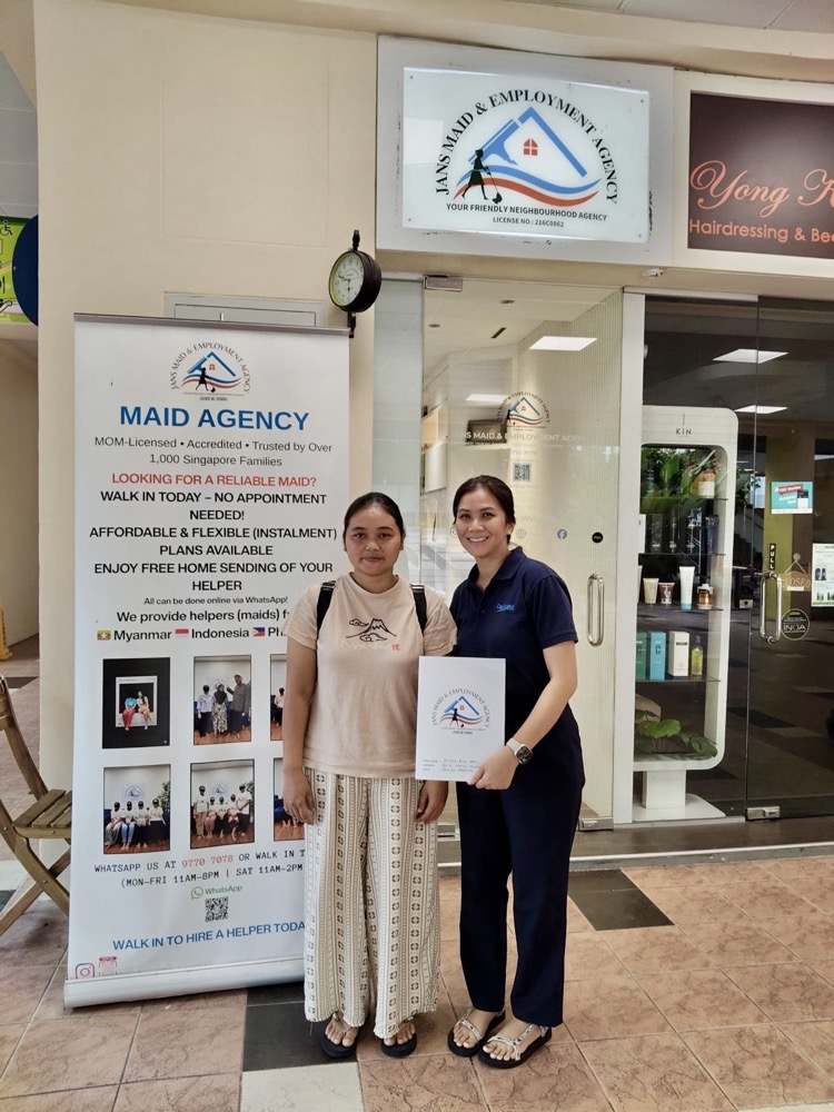 A Jans Maid and Employment Agency consultant with a helper