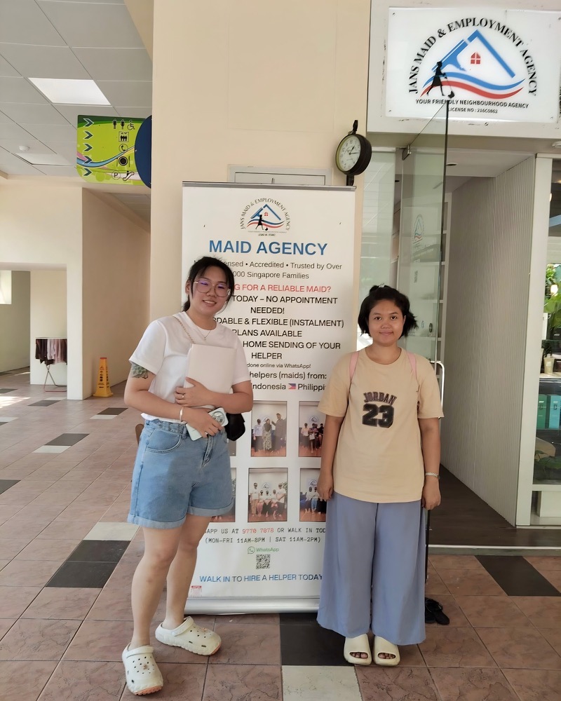 Two people after a placement handover at Jans Maid & Employment Agency Depot Road