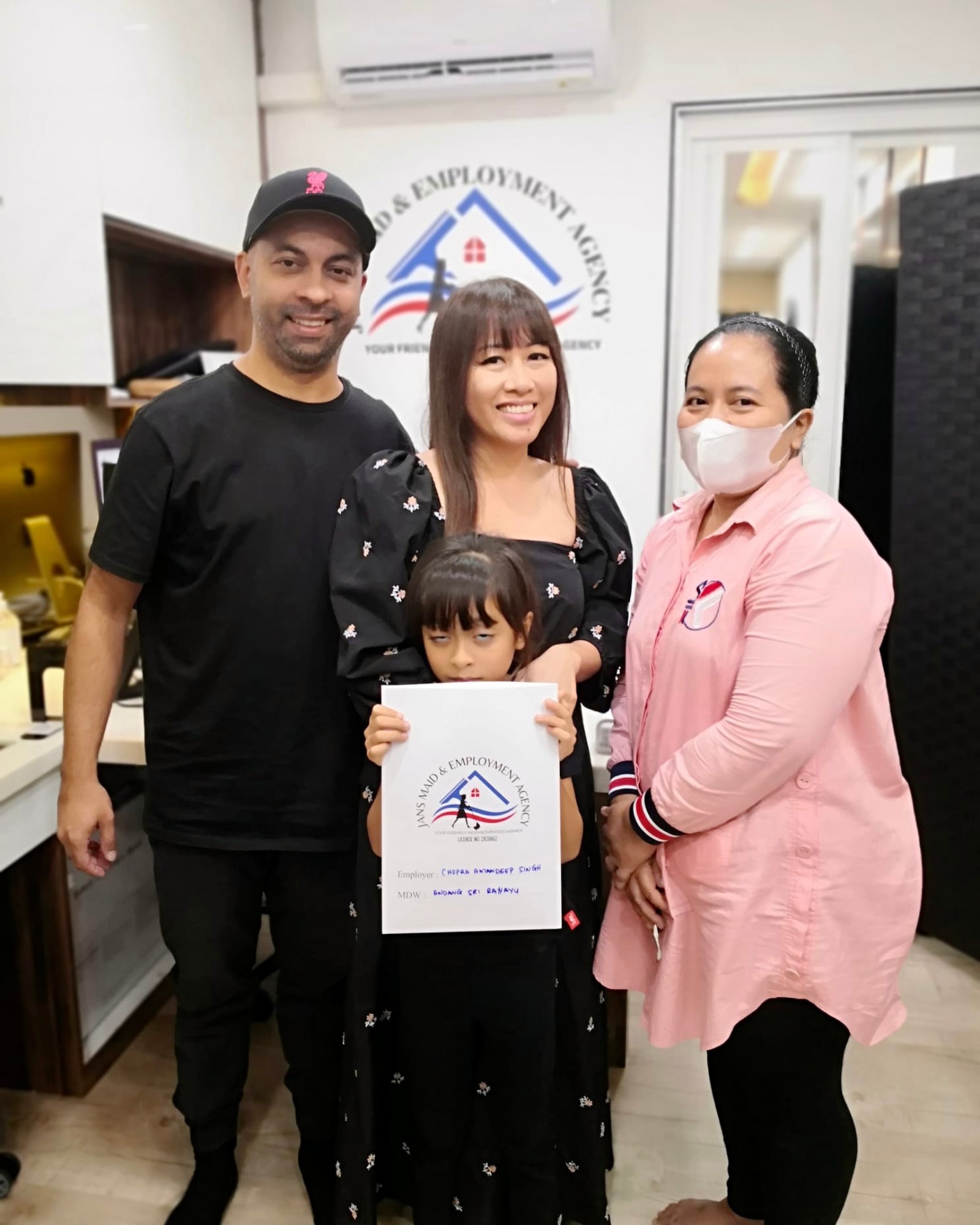 Mr Amandeep Chopra and his family with their domestic helper after a placement supported by Jans Maid & Employment Agency at Depot Road